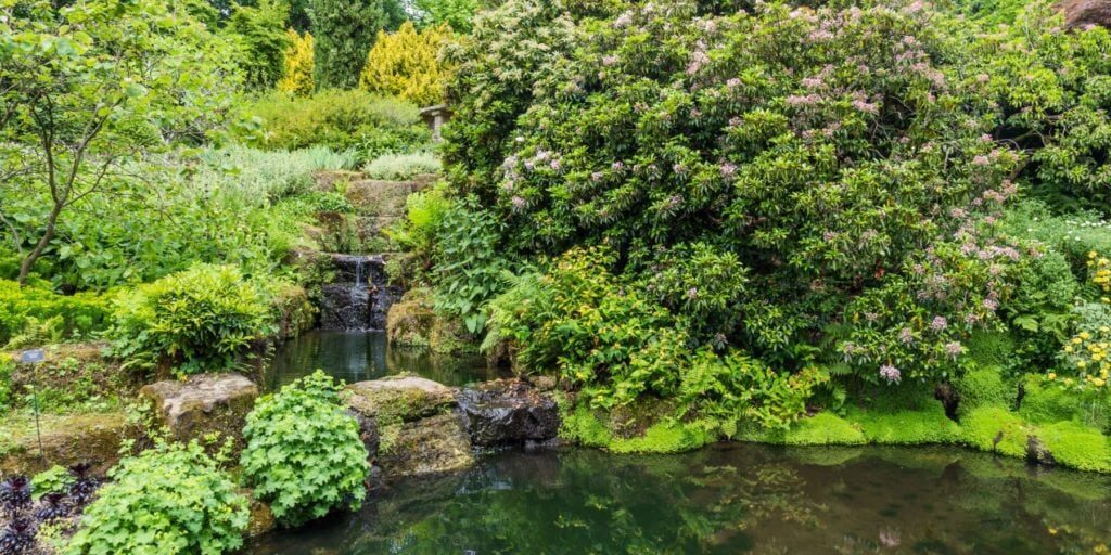 Colorful British castle garden during spring in Sussex, England